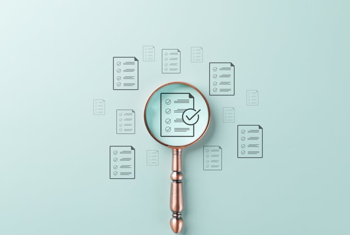 magnifying glass with checklist
