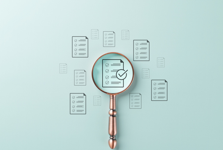 magnifying glass with checklist
