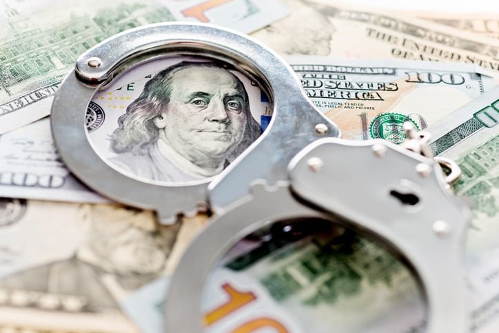 Handcuffs on money